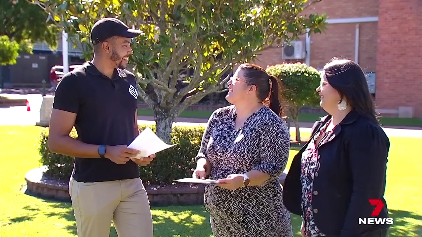 Elisha Taderera with Angela and Gayle from Wide Bay Kids in the 7 News story on Social365